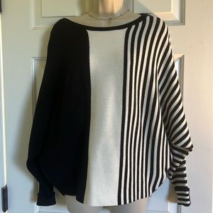 Size Medium Philosophy Black and White color block and stripe sweater.